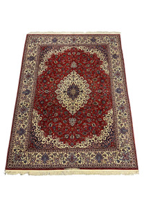 Angled view of Persian Isfahan Silk Rug showcasing intricate design