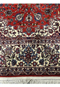 Angled view showing the texture of Persian Isfahan Silk Rug