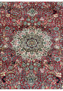 Detailed view of the corner of the 5 x 8 Oriental Kashmir Silk Rug, focusing on the intricate floral border and fringe detailing.