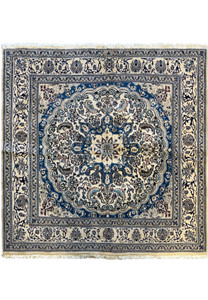 Overhead view of a 6'3 x 6'7 Persian Nain Square Rug featuring intricate blue and ivory floral patterns with a central medallion.