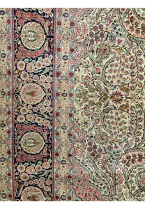 Side border detail of a 8x10 Persian Tabriz 100% silk rug with floral motifs