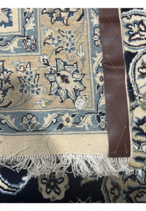Another backside view of this 13x19'8 Nain 9LA Persian Rug to showcase the high quality.