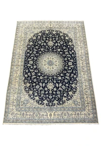 Full view of the luxurious 13 x 19'8 Persian Nain Rug with 80% wool and 20% silk composition