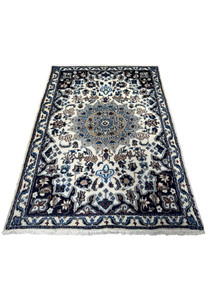 Laid down view of a 3 x 4'5 Nain Persian Rug showing detailed patterns.