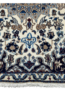 Lower border view of a 3 x 4'5 Nain Persian Rug displaying floral motifs.