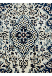 Close-up of medallion design on 3x4'10" Persian Nain Rug