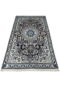 3x5 Nain Persian rug displayed flat, highlighting its detailed craftsmanship.