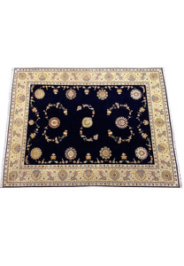 Top view of the intricate design and vibrant colors of a 10x13 Persian Tabriz rug