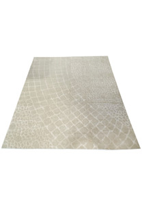 Full view of the contemporary 11' x 14' wool rug, featuring a cobblestone pattern in subtle off-white tones for a minimalist aesthetic.