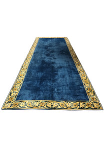 11' x 30' French Rug laid flat, displaying the vibrant blue color and detailed border design.