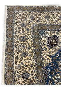 Detailed view of the border on the 16' x 16' Persian Nain rug with beige, navy, and taupe accents.
