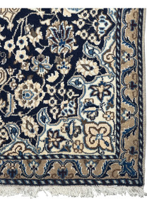 Edge and fringe detail of 3'1 x 5 Persian Nain Rug showing its quality craftsmanship.