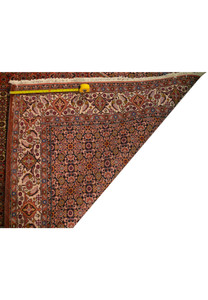Back of Persian Bijar rug revealing tight hand-knotted weave and dense knot structure