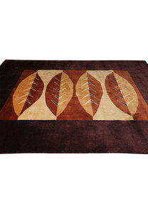 Side angle showing color variation and soft pile of modern handmade rug
