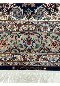 Signed Persian Isfahan rug with Heydari weaver name and Iran Esfahan inscription on silk end panel