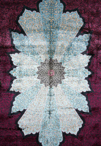 Close-up of central floral medallion on 6x9’5 Chinese silk oriental rug with sky-blue and ivory tones
