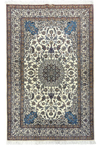 Full view of a signed 5'8" × 9' Persian Nain 4 LA Habibian rug showing ivory field, central blue floral medallion, and detailed beige and navy borders.