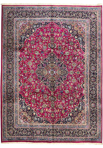 Full laid-down view of 9'9 x 12'8 semi-antique Persian Mashad red wool rug with navy border and central medallion.