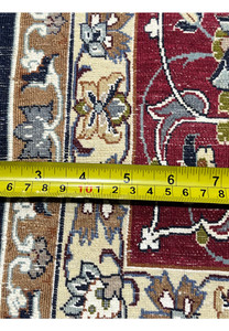 Backside close-up showing knot density, crisp pattern definition, and craftsmanship quality of the 7x11 Persian Isfahan rug.