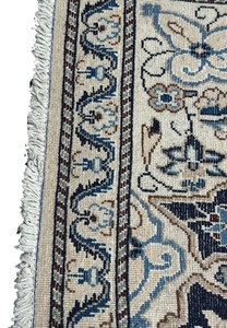 Backside of 3x5 Persian Nain rug showing tight knot structure, ivory weft threads, and fine high density weaving
