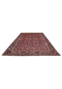 Large 6'6 x 9'6 Persian Bijar iron rug laid flat showing bold red field and repeating all over floral design