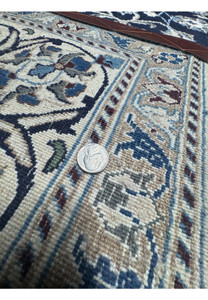 Measured backside of square Persian Nain rug confirming hand knotted construction, fine density, and accurate dimensions