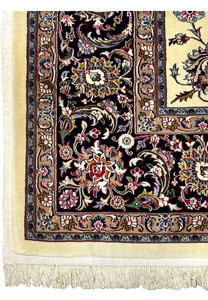 Dark navy floral border detail of signed Persian Mashad Saber Persian rug