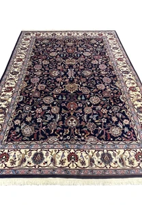 Top view of Persian Sarough rug showing symmetrical allover floral composition