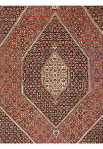 Close up of central geometric medallion in Bijar Persian iron rug with ivory highlights and dark navy outlines