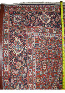 Backside of hand knotted Bijar Persian iron rug showing tight knot structure and dense wool weave