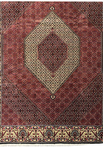 Lower section view showing geometric pattern transitions and rich red tones in a Persian Bijar rug