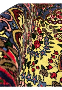 Backside view of Persian Bijar rug revealing dense knotting, cotton foundation, and tight weave that gives Bijar rugs their strength