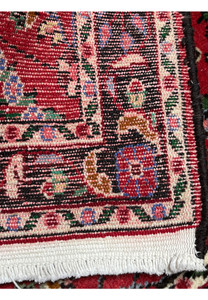 Backside view of a Persian Darjazin rug showing tight, even knotting, wool foundation, clear pattern visibility, and authentic village weaving technique