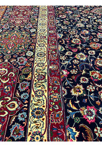 Overall Persian Mashad rug design showing balanced medallion layout, dense floral field, elegant borders, and fine kork wool with silk detailing