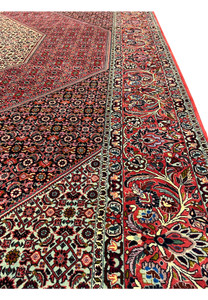 Edge detail of a Persian Bijar iron rug highlighting dense wool pile, straight selvedge, tight knotting, and exceptional structural integrity