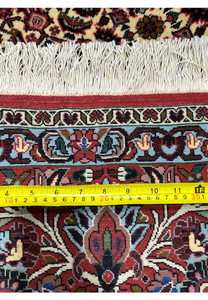 Close-up of the backside of a Persian Bijar rug revealing compact knots, heavy wool construction, and exceptional durability typical of iron rugs