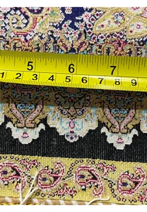 Measured backside view of a signed Persian Qum pure silk rug showing fine weave density and knot precision