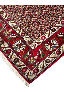 Edge and fringe detail of Persian Senneh rug showing clean finishing, tight weave structure, and well-preserved wool pile