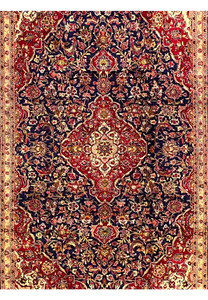 Field detail of Persian Isfahan rug featuring dense floral vines, navy blue background, soft gold accents, and fine hand knotted structure