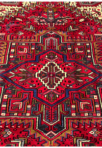 Closeup of Heriz medallion showing crisp outlines tight weave texture and bold angular tribal design craftsmanship in wool pile