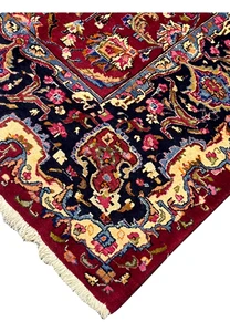 Edge and fringe view of handmade Mashad rug displaying clean finishing, intact foundation, and well-preserved wool pile
