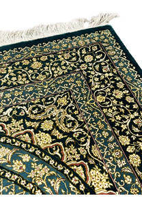 Top edge with silk fringe and floral border detail, showing clean foundation and fine craftsmanship