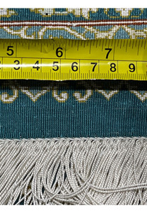 Backside closeup with ruler measuring knot density on pure silk Qum rug highlighting extremely fine 1000 KPSI weave and precision weaving