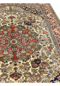 Angled perspective of Persian Bijar rug highlighting ivory field floral density and strong structural body