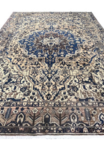 Top view of large 11 x 13'3 Persian Heriz rug in muted navy and ivory showing full geometric layout and strong border framing