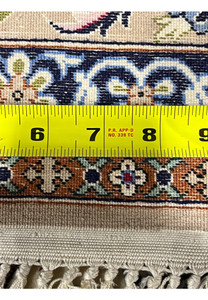 Backside with ruler Persian Isfahan wool silk rug measuring knot density hand knotted cotton foundation Darri