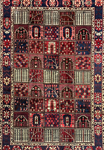 Midfield garden panels of 7x10 hand-knotted Persian Bakhtiari rug with cypress and floral compartments