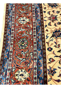 9x13 Persian Sarough rug main border closeup rust ground ivory rosettes sky blue guard