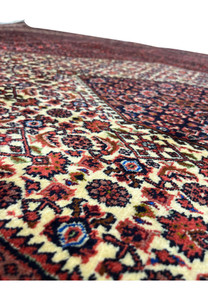 Fine Herati lattice closeup on ivory field, authentic Kurdish Bijar weaving detail