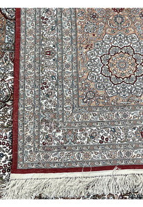 Backside of this authentic Turkish silk rug showing fine hand-knotted weave on pure silk foundation